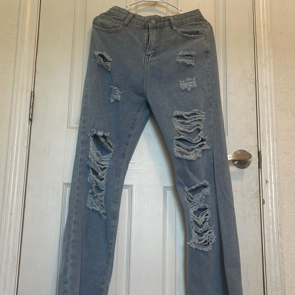 Flared detail high waisted ripped jeans, tried on but never worn
